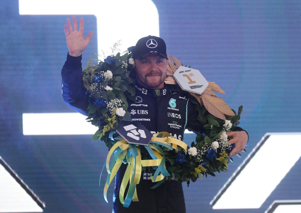 Which F1 driver has the most podiums in the hybrid era?