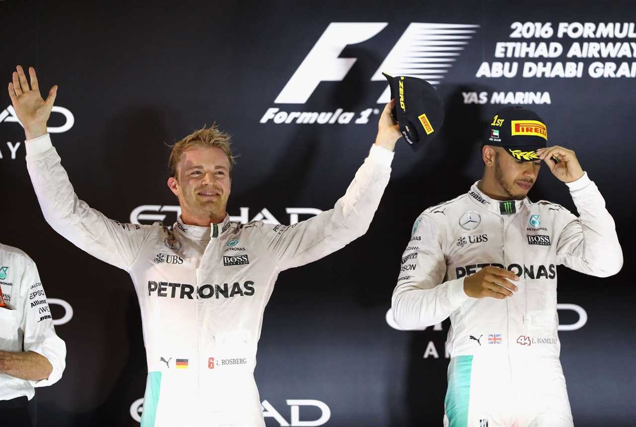 Nico Rosberg and Lewis Hamilton on the podium during the Abu Dhabi Formula One Grand Prix at Yas Marina Circuit on November 27, 2016, in Abu Dhabi, United Arab Emirates (Photo by Clive Mason/Getty Images)