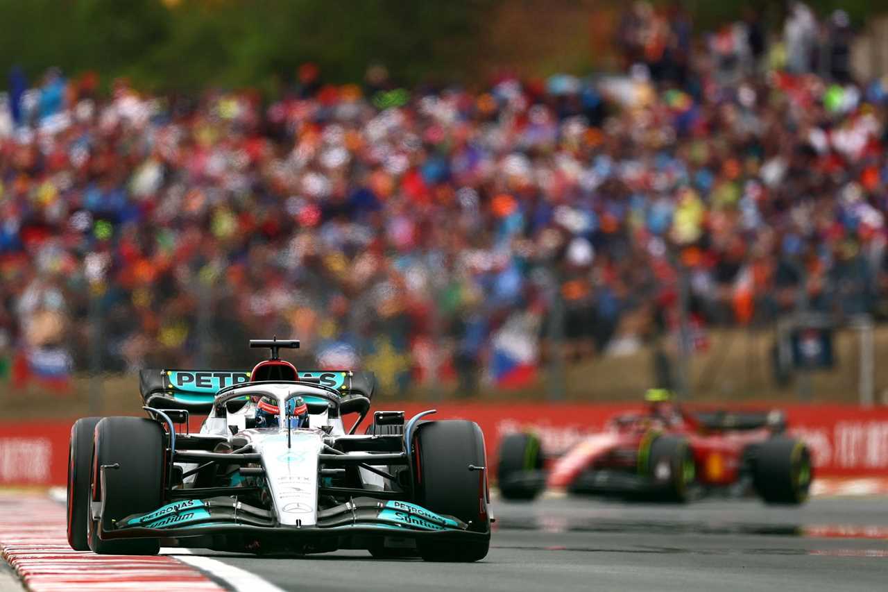 Mercedes' George Russell leads Ferrari's Carlos Sainz during the F1 Grand Prix of Hungary at Hungaroring on July 31, 2022, in Budapest, Hungary (Photo by Francois Nel/Getty Images)