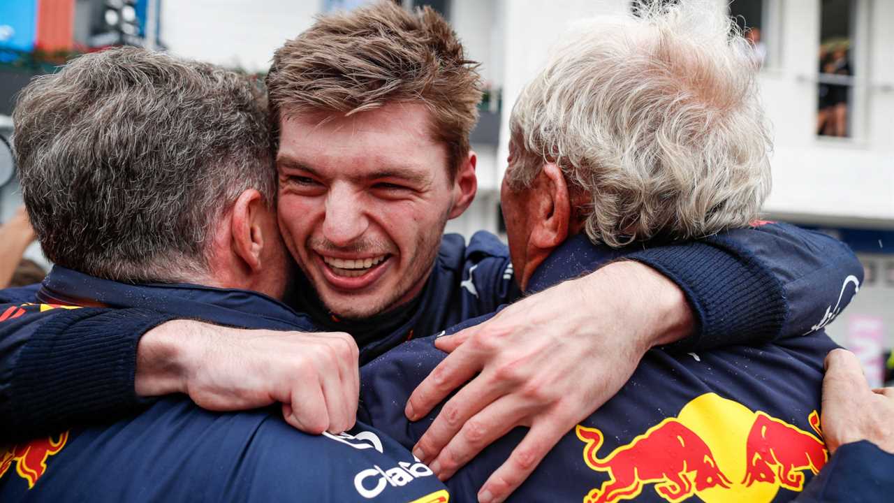 Christian Horner, Max Verstappen and Helmut Marko celebrate the win.  HungaryJuly 2022