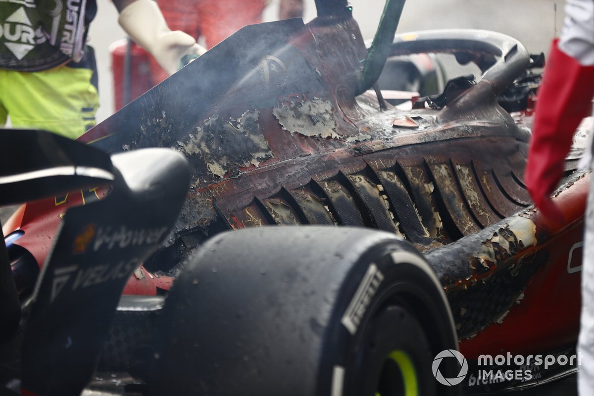 The burned out car of Carlos Sainz, Ferrari F1-75, after a fire causes his retirement