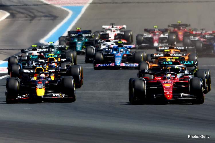 LE CASTELLET, FRANCE - JULY 24: Charles Leclerc of Monaco driving the (16) Ferrari F1-75 leads Max Verstappen of the Netherlands driving the (1) Oracle Red Bull Racing RB18 and the rest of the field into turn one at the start during the F1 Grand Prix of France at Circuit Paul Ricard on July 24, 2022 in Le Castellet, France.  (Photo by Mark Thompson/Getty Images) innovation