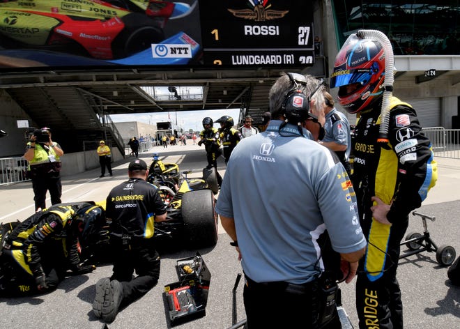 Andretti Autosport with Curb-Agajanian driver Colton Herta (26) stands by his car after leaving the race Saturday, July 30, 2022, during the Gallagher Grand Prix at Indianapolis Motor Speedway.