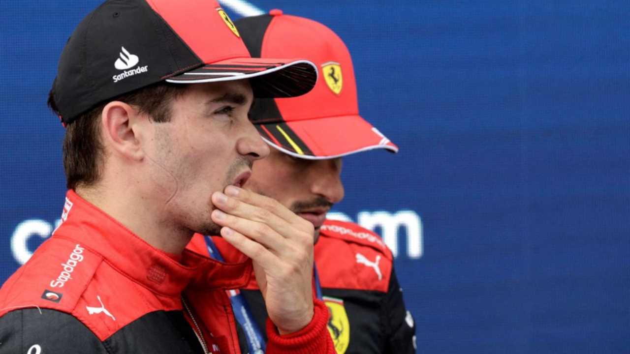 Charles Leclerc and Carlos Sainz, Ferrari, looking down beat. Austria July 2022.