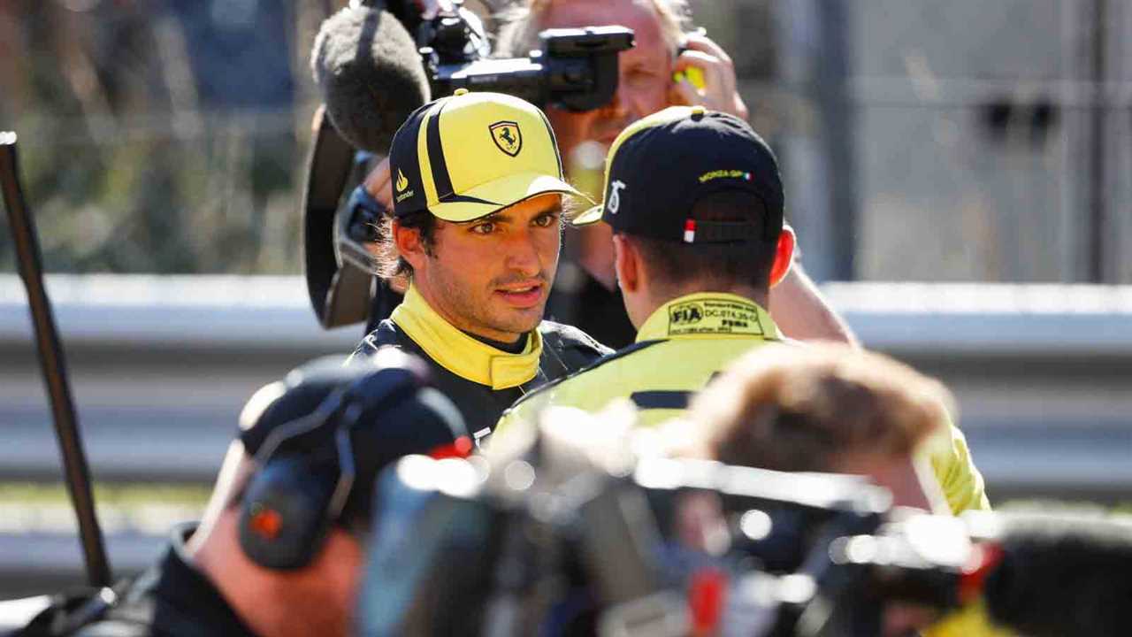 Carlos Sainz with Charles Leclerc.  Monza September 2022.