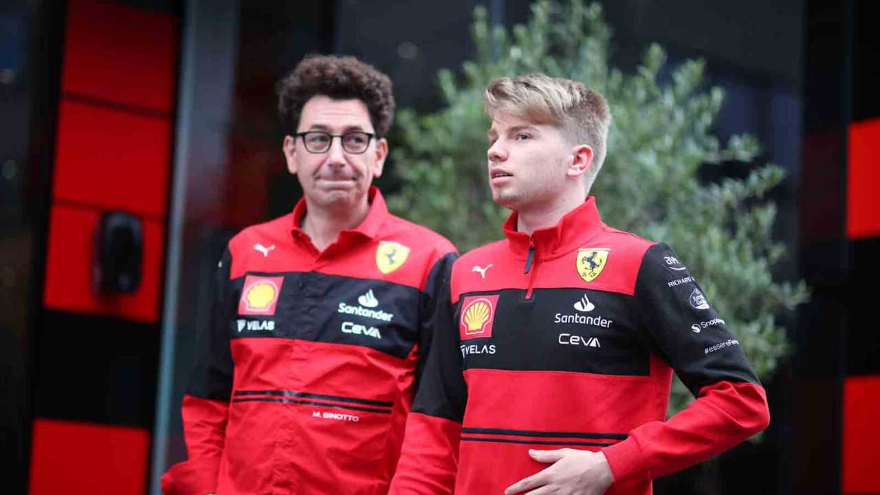 Mattia Binotto with Ferrari junior Robert Shwartzman. Spa August 2022.