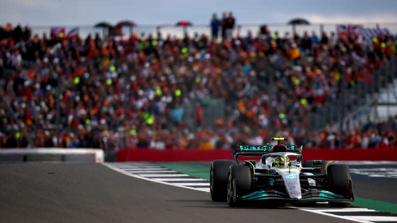 A photo of Lewis Hamilton racing his Mercedes F1 car at Silverstone. 