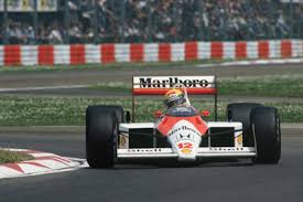 McLaren's Ayrton Senna leads in the MP4/4 at Imola from teammate Alain Prost (Image Credit: Motorsport Images)