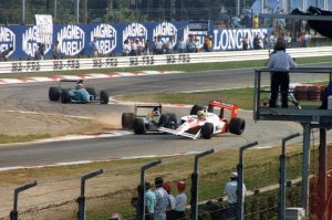 Senna and his MP4/4 collides with a lapped Williams (Image Credit: The Race)