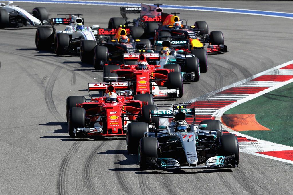 sochi, russia april 30 valtteri bottas driving the 77 mercedes amg petronas f1 team mercedes f1 wo8 leads sebastian vettel of germany driving the 5 scuderia ferrari sf70h kimi raikkonen of finland driving the 7 scuderia ferrari sf70h and the rest of the field at the start during the formula one grand prix of russia on april 30, 2017 in sochi, russia photo by will taylor medhurstgetty images