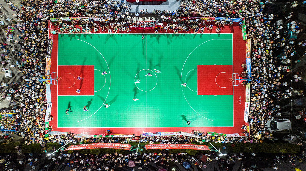 An aerial shot of a basketball match in a village in Ruichang City, Jiangxi Province, Aug. 22, 2022. /CFP