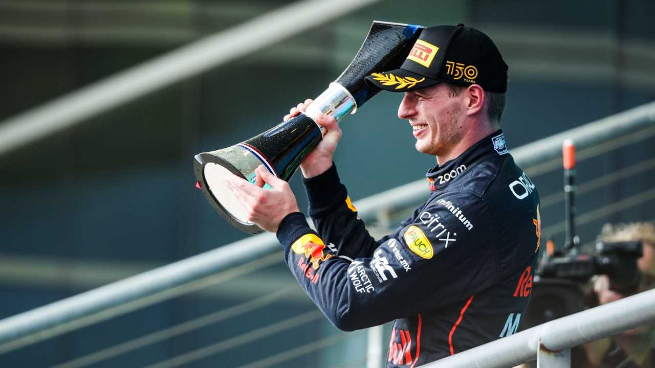 Max Verstappen lifting the winner's trophy. Austin, October 2022.