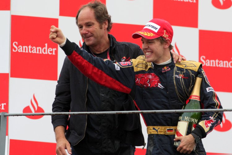 Sebastian Vettel (GER) Scuderia Toro Rosso celebrates on the podium with Gerhard Berger (AUT) Scuderia Toro Rosso Team Part Owner Formula One World Championship, Rd 14, Italian Grand Prix, Race, Monza, Italy, Sunday 14 September 2008.