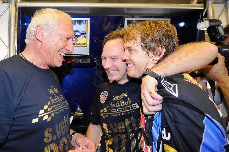 ABU DHABI, UNITED ARAB EMIRATES - NOVEMBER 14: Red Bull Racing team owner Dietrich Mateschitz (L) and Team Principal Christian Horner (C) congratulates Sebastian Vettel (R) of Germany and Red Bull Racing in their team garage during the Abu Dhabi Formula One Grand Prix at the Yas Marina Circuit on November 14, 2010 in Abu Dhabi, United Arab Emirates.  (Photo by Clive Mason/Getty Images) *** Local Caption *** Dietrich Mateschitz;  Sebastian Vettel;  Christian Horner