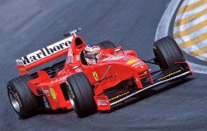 Michael Schumacher wrestles with his 1998 Ferrari F300 in Brazil (Image Credit:@F1_Images on Twitter)