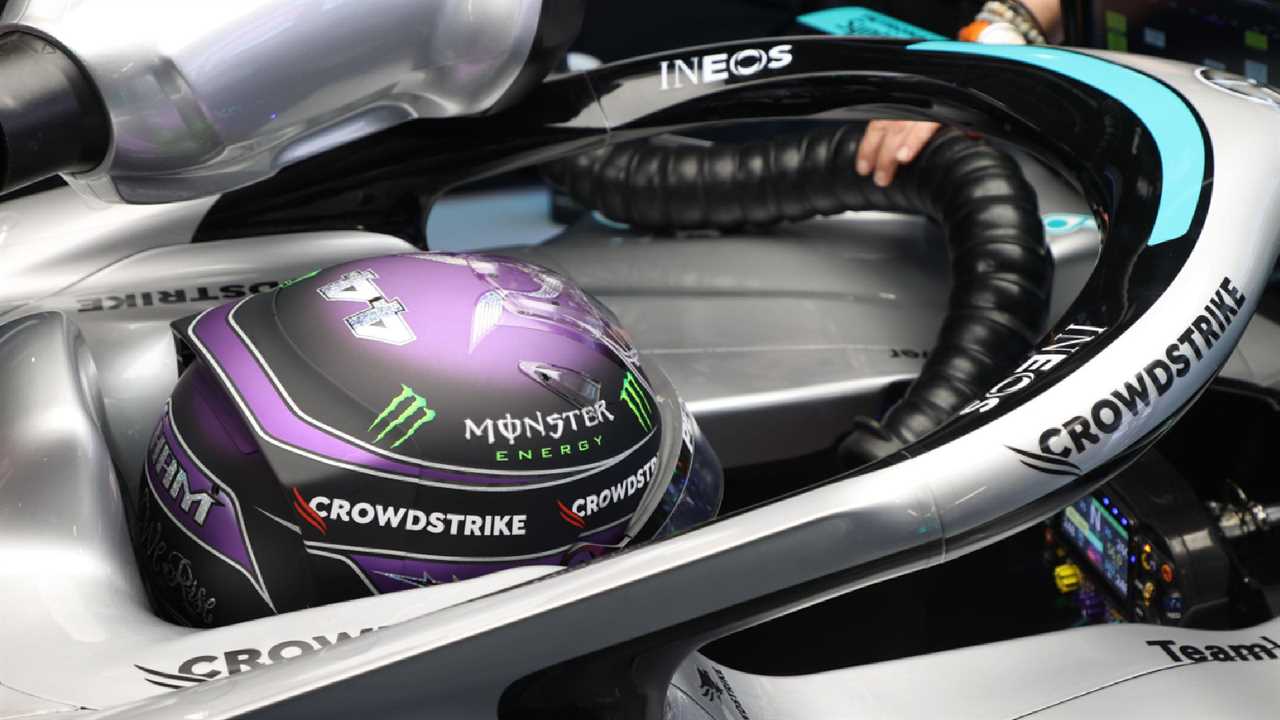 Mercedes' Lewis Hamilton in the cockpit of his W13. F1 pedals