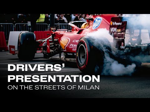 Lewis and Charles driving TOGETHER on the streets of Milan