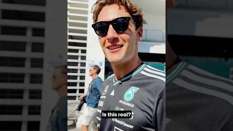 Fernando Alonso has George Russell on his phone case???