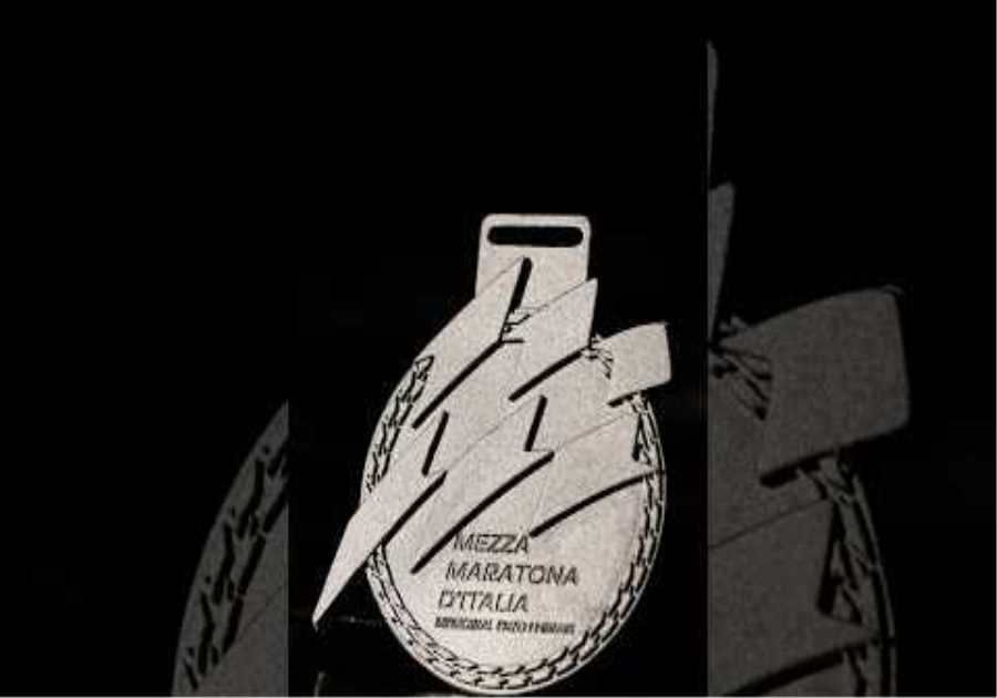 Only the fastest take the Ferrari-crafted medal. #MezzaMaratonadItalia