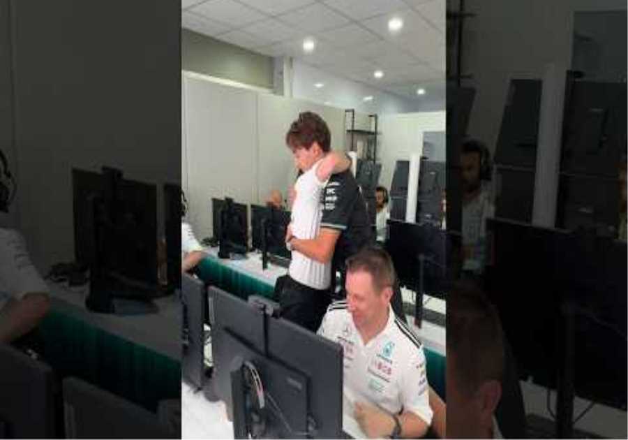 George Russell celebrates with Team after Pole Position