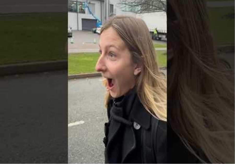 Doriane reacts to the huge championship poster of her outside the factory!